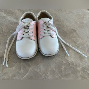 Pink and white saddle Oxford shoes